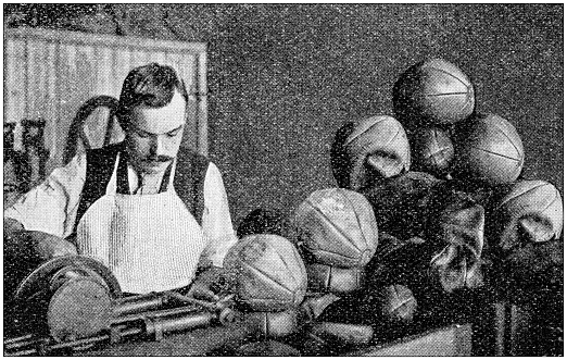 Antique photograph: Production of a football ball