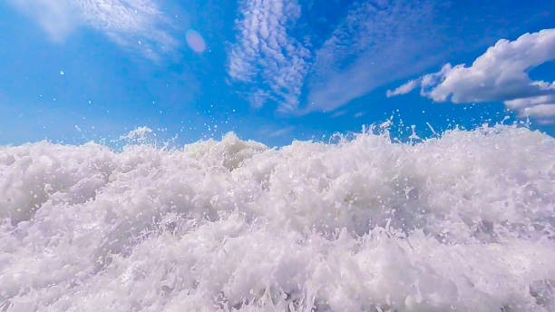 istock The wave on the pebble beach in the summer 1032646154