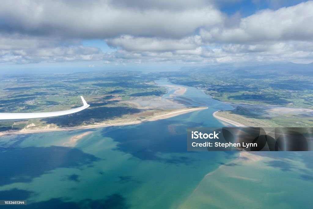 Gliding in North Wales Over the Irish Sea Cumulus Cloud Stock Photo