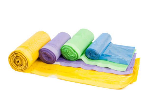 istock roll of plastic garbage bags isolated on white background 1032654286
