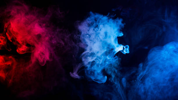 istock mixed colors of blue and red smoke 1032655594