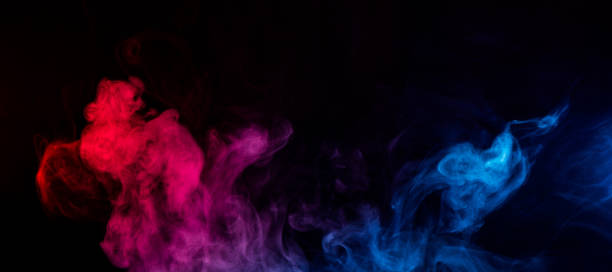 istock mixed colors of blue and red smoke 1032655916