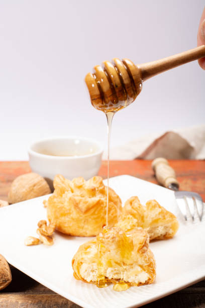 istock French snack pouches made from puff pastry with fresh soft goat cheese and honing 1032655948