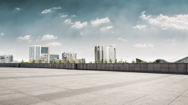 istock modern business building with glass wall from empty floor 1032658912