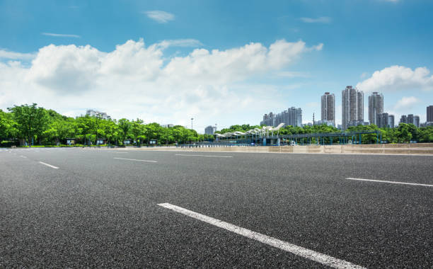 istock City park under blue sky with Downtown Skyline in the Background 1032660498