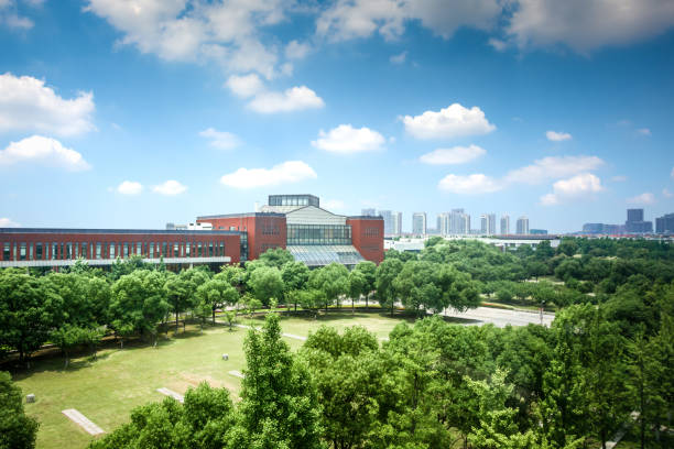 istock modern city road and building with grass 1032661616