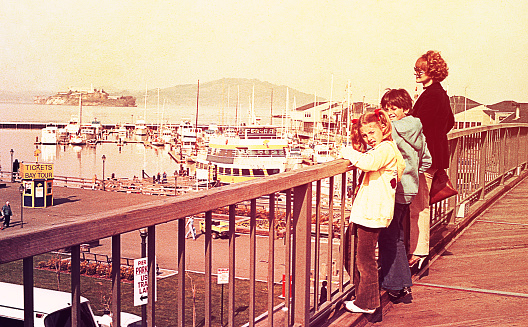 Vintage image of a mother and her children at the San Francisco port