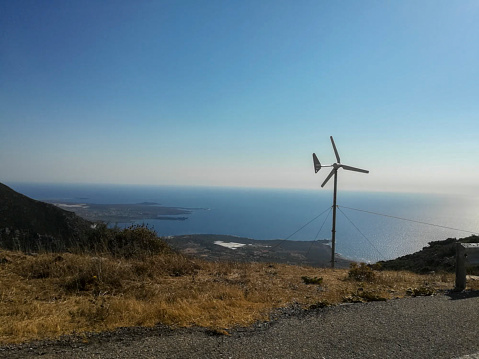 Wind turbine collecting wind energy in south of Spain. Sustainability and renewable energy.