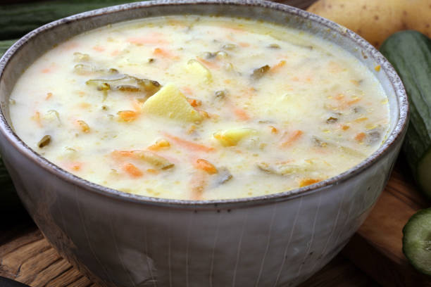 istock Polish cucumber soup with fresh cucumber and potatoes. 1032674028