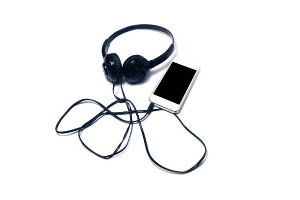 istock white mobile phone connected with headset on white background isolated 1032677504