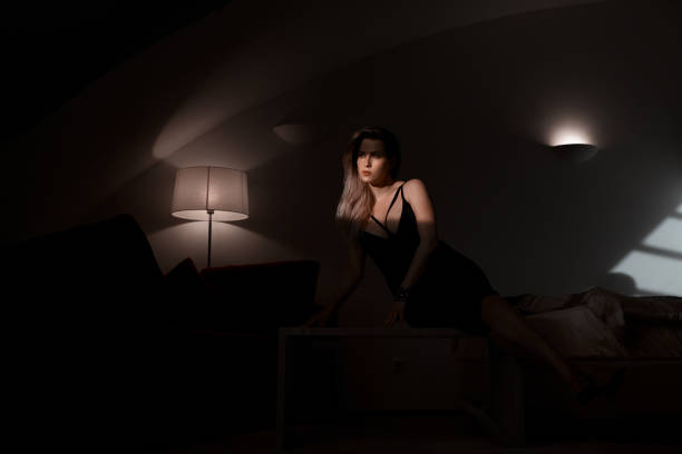 istock seductive woman in the bedroom 1032678606