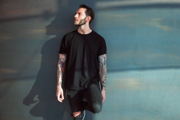 istock Portrait of tattooed young man 1032679244