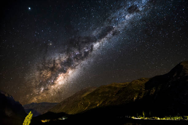istock Andes mountains views surrounded by a milky way galactic corel.  From the valleys to the summits such an incredible rough landscape could be found in central Andes mountain range at Santiago de Chile 1032687840