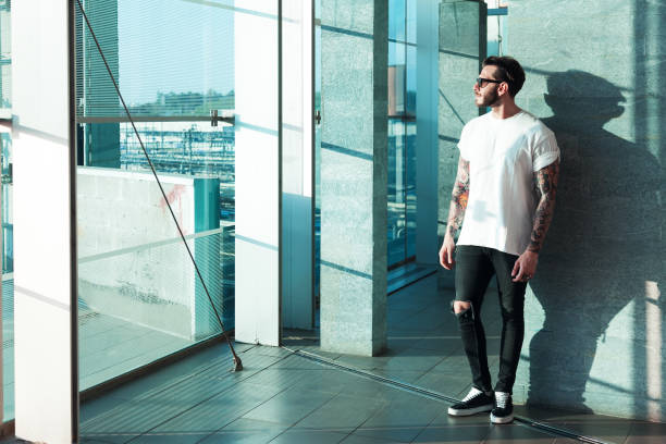 istock Portrait of tattooed young man 1032702300