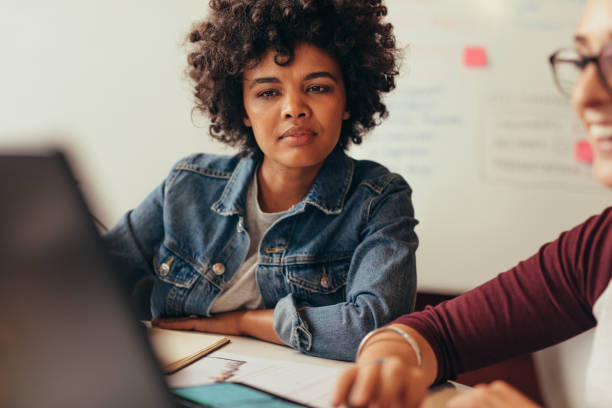 istock People working at small coworking space in office 1032708468
