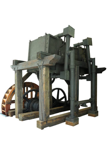 istock Ancient rusty old wooden water wheel driven machine isolated over white 1032711652