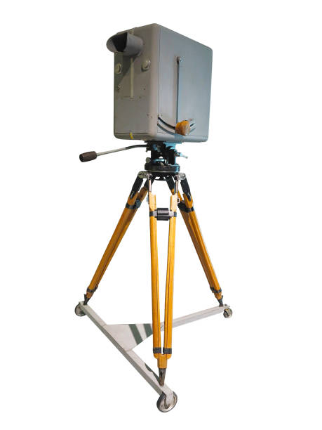 istock Retro ancient TV Professional studio old video camera on tripod isolated on white background 1032711878