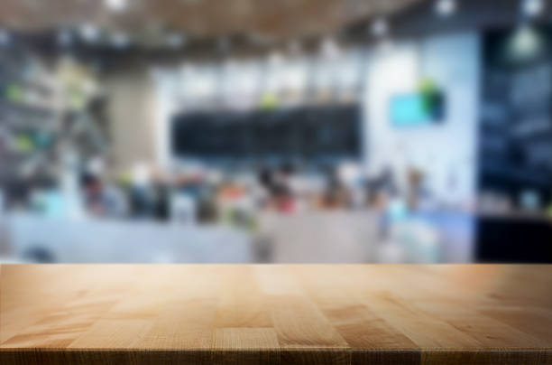 istock Close-Up Of Wooden Table At Restaurant 1032712408