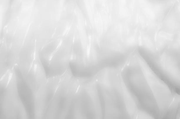 istock fabric, background texture. Silk Black and white. Add some drama to your look with this Black and White Candy Striped Silk Charmeuse.  this charmeuse is as bold as they come! 1032713358