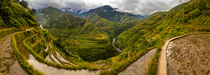 Cordillera, Philippines, Asia- November 15, 2017: Cordillera  view showing mountains, grasses, mud, water and river can be seen in the background in Banaue area