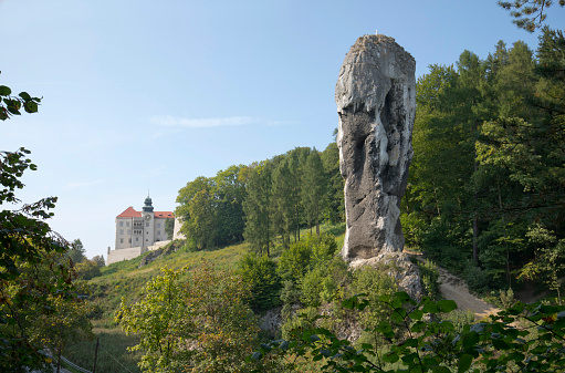 The picturesque fortified castle in Pieskowa Skala lies above the picturesque valley among limestone rocks