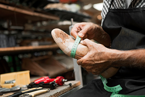 Shoemaker making shoes
