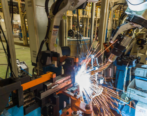 istock Robots welding machine in a car factory 1032724286