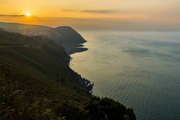 istock A view over Exmoor National Park cliffs  above the sea during sunset, a dark and dramatic view of the south west coast of Great Britain, UK 1032725962