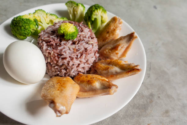 istock clean food , Fried chicken ,Broccoli  vegetable , egg and rice 1032728916
