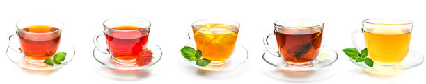 Collection cup of tea and strawberry, mint and lemon on white Collection cup of black, camomille and green tea with strawberry, mint leaves and lemon slice on white tea cup and saucer stock pictures, royalty-free photos & images