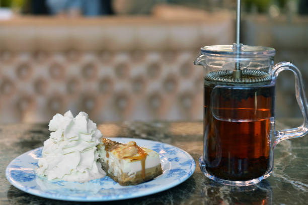 istock Tee and Cheesecake with caramel and cream 1032749392
