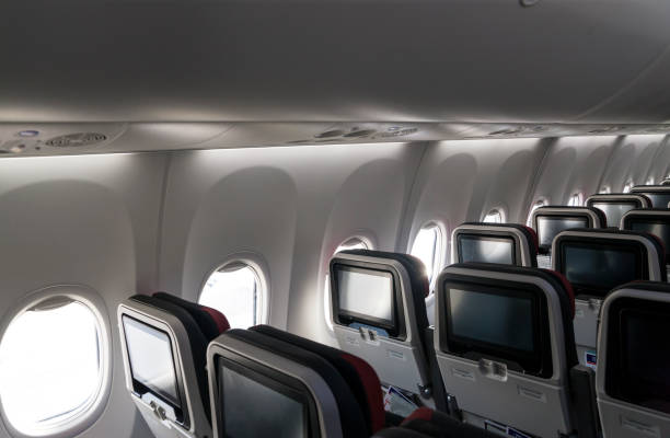 istock Airplane seat with screens in chairs back 1032753520