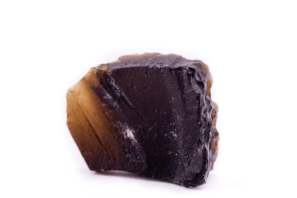 istock Macro mineral stone Tectites on a white background close up 1032758096