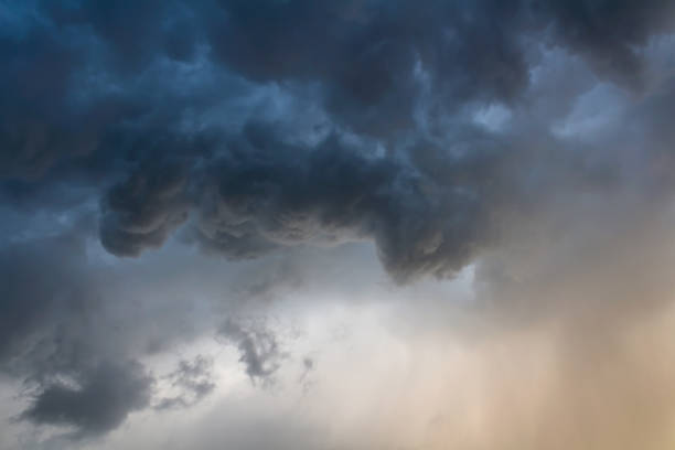 istock Amazing storm clouds with orange sun light 1032766016