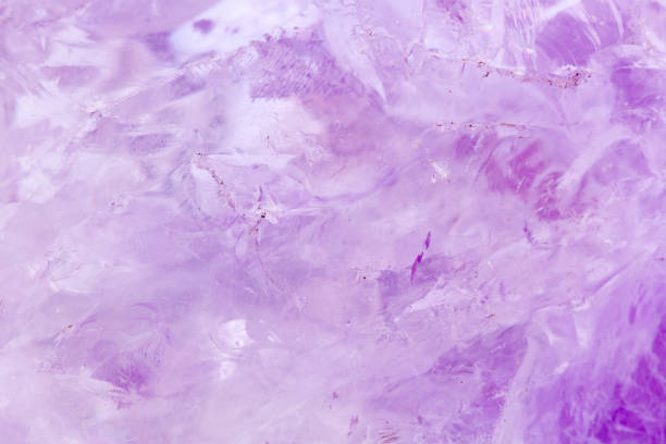 istock Macro Mineral Stone Amethyst on a white background 1032770660