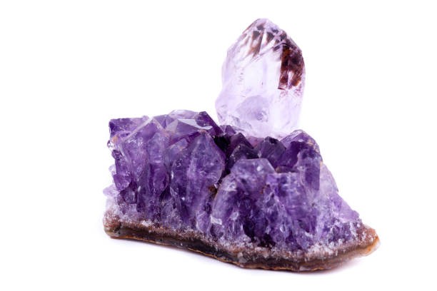 istock Macro Mineral Stone Amethyst on a white background 1032770754