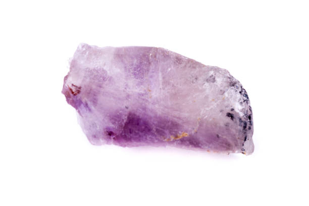 istock Macro Mineral Stone Amethyst on a white background 1032770810