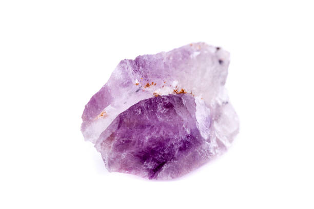 istock Macro Mineral Stone Amethyst on a white background 1032770828