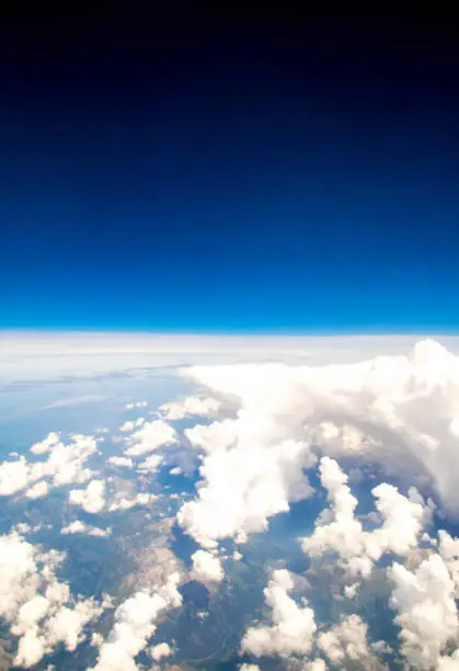 A view from altitude of a storm build up.