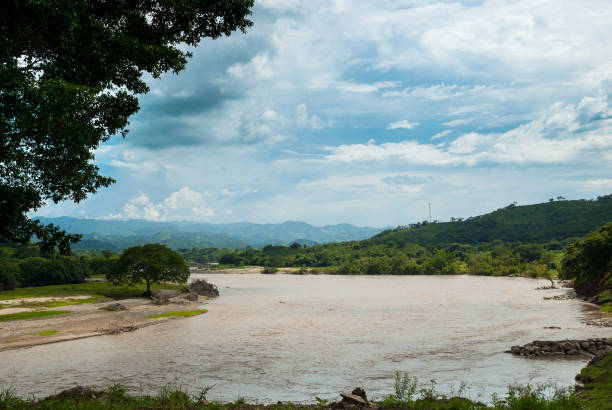 istock River called Motagua cloudy winter in El Progreso, Guatemala. Turbid river. 1032786368