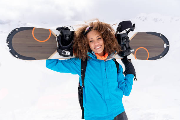 Portrait of a happy snowboarder