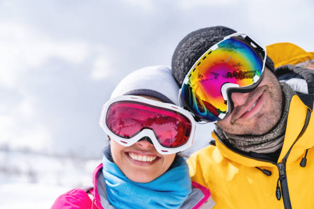 istock Happy couple having fun skiing in the Alps 1032803272