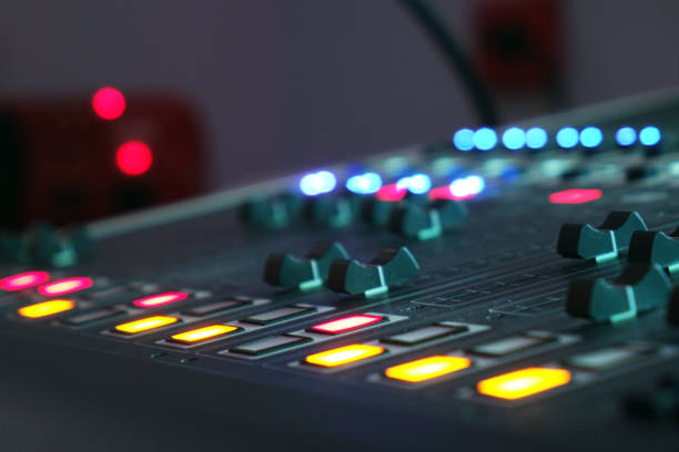 istock The audio mixer in the Studio, the handles move up and down, all ready to record. 1032803844