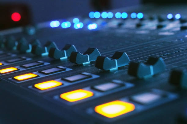 istock The audio mixer in the Studio, the handles move up and down, all ready to record. 1032804280
