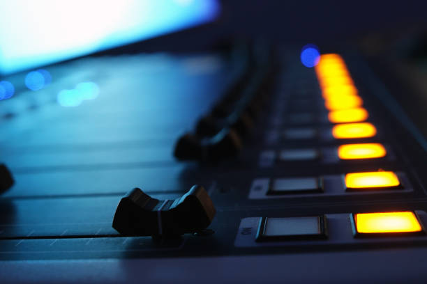 istock The audio mixer in the Studio, the handles move up and down, all ready to record. 1032804964