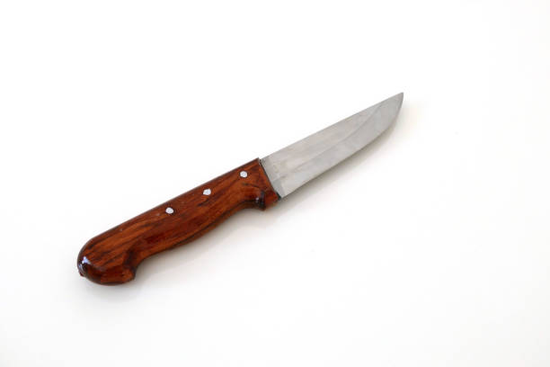 istock sharp turkish knives with wooden handle on white ground, 1032806414