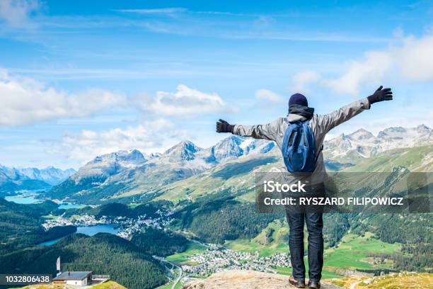 Young Hiker Standig Front Of The Top Of Piz Da Staz And Lakes In The Area Stmoritz Stock Photo - Download Image Now