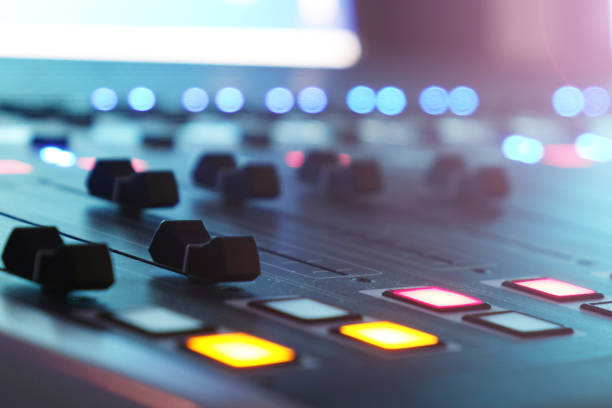 istock The audio mixer in the Studio, the handles move up and down, all ready to record. 1032806818