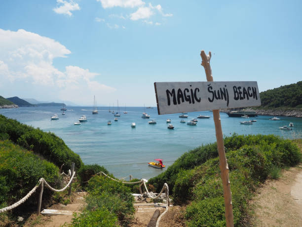 View of the beautiful beach Sunji Beach in Lopud island in a sunny summer day. Dubrovnik, Croata View of the beautiful beach Sunji Beach in Lopud island in a sunny summer day. Dubrovnik, Croata dubrovnik lopud stock pictures, royalty-free photos & images