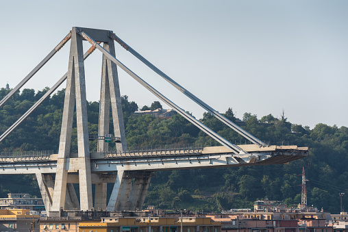 What remains of collapsed Morandi Bridge connecting A10 motorway after structural failure during a thunderstorm and heavy rain causing 43 casualties on August 14, 2018